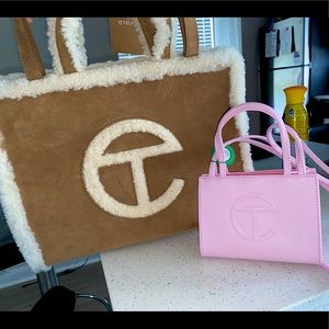 2 TEFLAR BAGS, LARGE ONE IS UGGS EDITION. BOTH BRAND NEW AND NEVER USED.